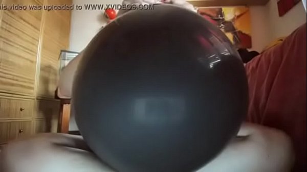 A huge black balloon will be used as if it were a big hard cock!