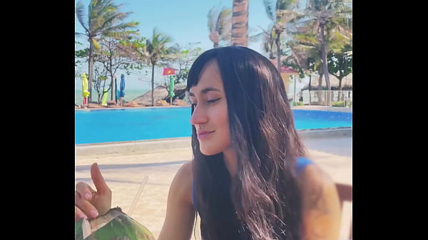 Sexy beauty girl and coconut. Poolside beautiful alert!